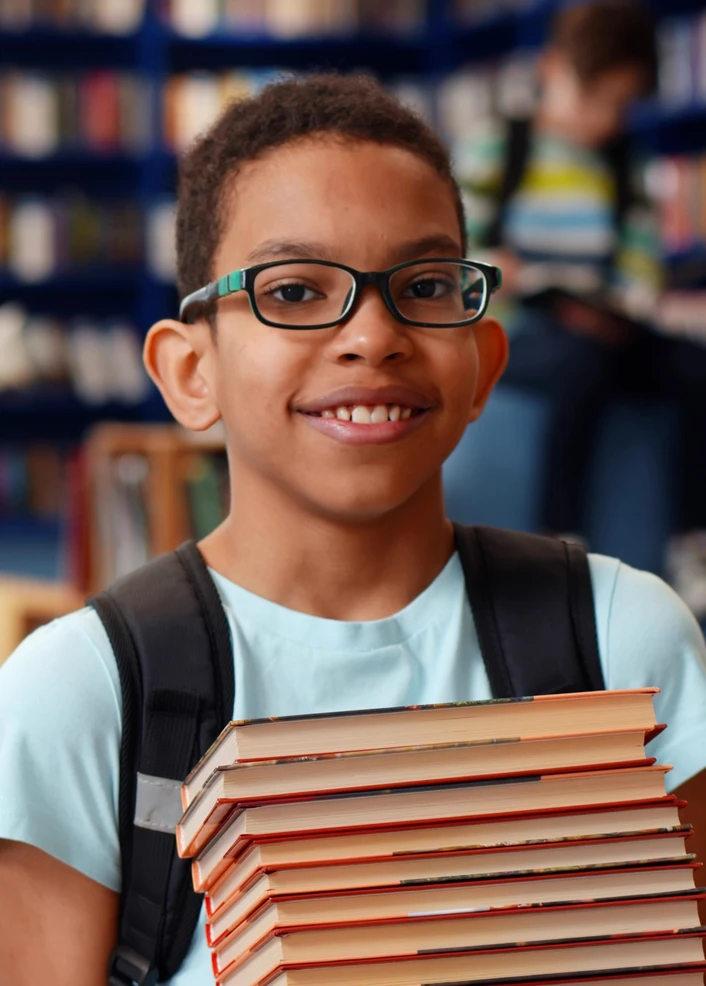 Kid with books